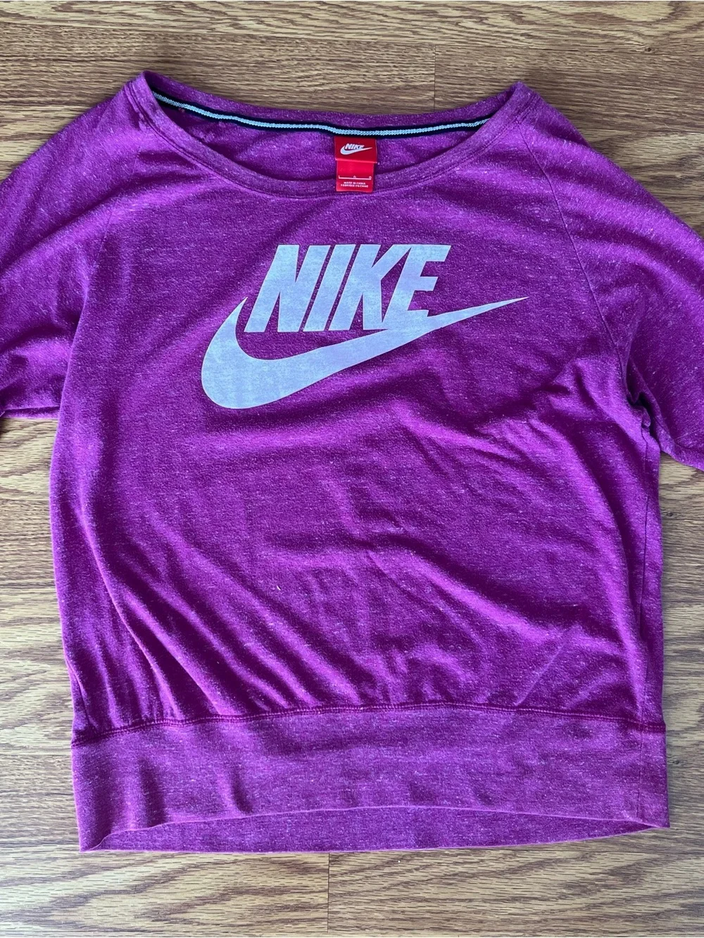 Nike Women's Scoop-Neck lightweight off shoulder pullover top in Magenta